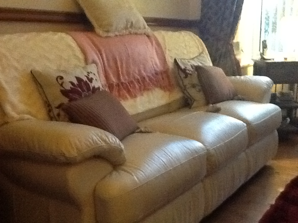 Cream leather and remote reclining chair